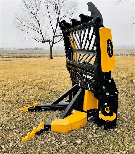 t post puller skid steer|best tree puller for tractor.